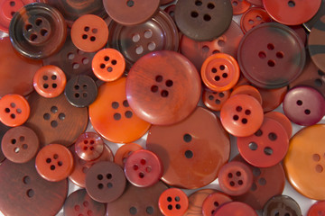Brown sewing buttons background