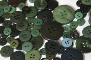 Green sewing buttons background