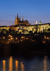 Fototapeta na wymiar Evening view with Prague Castle (Prazsky Hrad) and Vltava river
