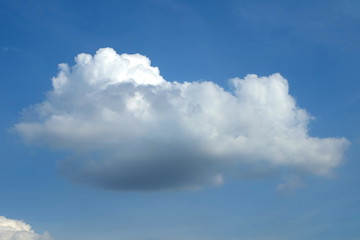 Naklejka na ściany i meble Cloud on Blue Sky Background.