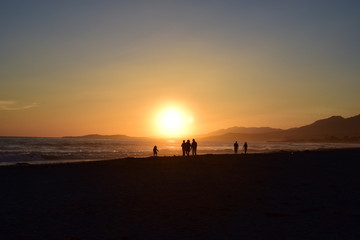 Fototapeta na wymiar People Enjoying Sunset