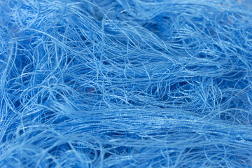 Neon Blue sewing thread roll background