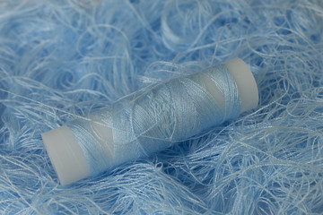 Pastel Blue sewing thread roll background