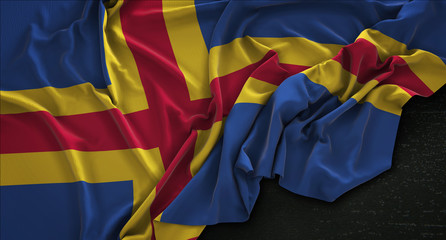 Aland Islands Flag Wrinkled On Dark Background 3D Render