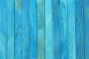 Fototapeta na wymiar Blue colored popsicle sticks background