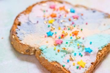 Unicorn food toasted bread with colorfur cream cheese