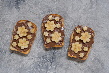 Toast bread with chocolate spread and banana
