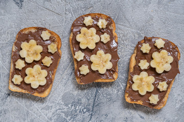 Toast bread with chocolate spread and banana
