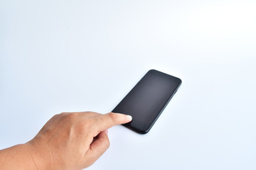 hand touch black smartphone on white background.