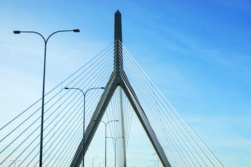 low angle view of the cable bridge against blue sky