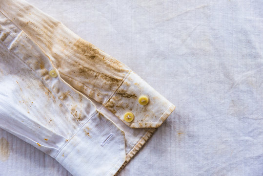 Image of dirty old white shirt