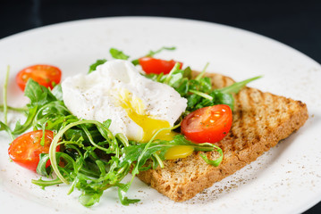 Fototapeta na wymiar poached egg on toast