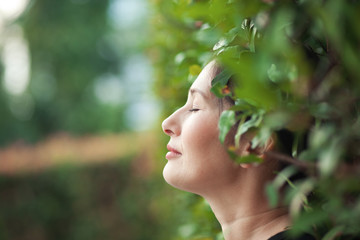 Woman in green garden 