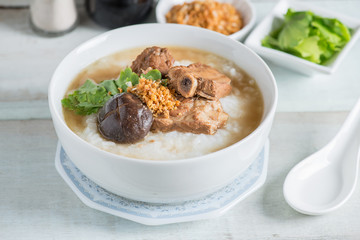 Rice porridge boiled pork ribs with shitake mushroom.