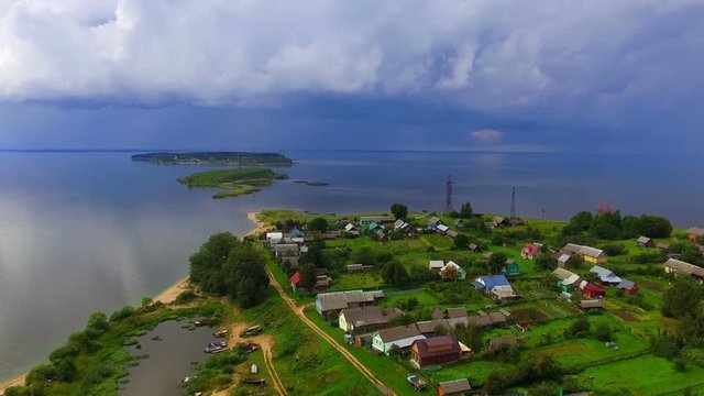 Aerial view on the settlement on the bank of lake