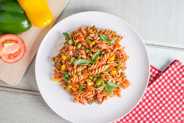 Pasta with tomato sauce, top view.