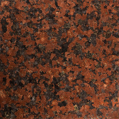 Texture of Red Granite. Dark color.