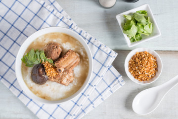 Rice porridge boiled pork ribs with shitake mushroom. Top view.