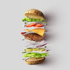 Fotobehang Hamburger ingrediënten tegen witte achtergrond © artjazz