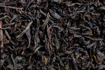 Heap of dry black tea texture macro