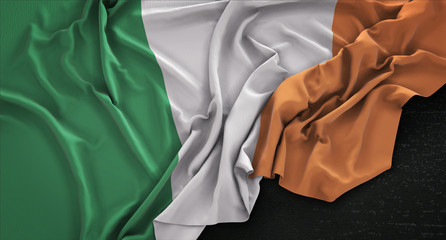 Ireland Flag Wrinkled On Dark Background 3D Render