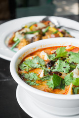 Thai spicy and sour soup with prawn (Tom Yum Goong), popular Thai cuisine