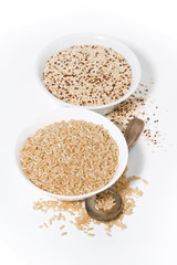 brown rice and quinoa in a bowl on a white background, vertical top view