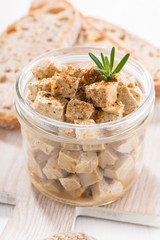 marinated feta in a glass jar, closeup