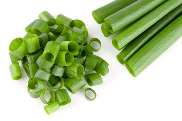 Chopped fresh green onions isolated on white background. Top view