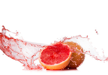 Water splash with grapefruits and lime isolated on white background. Splash motion with fruits. Abstract object 