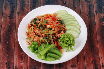 Fried spicy basil with minced pork .