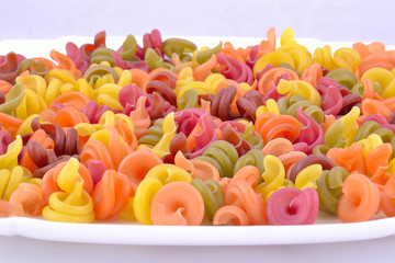 Colored pasta on a plate