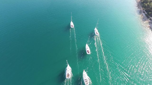 Aerial view of sailing boats moving