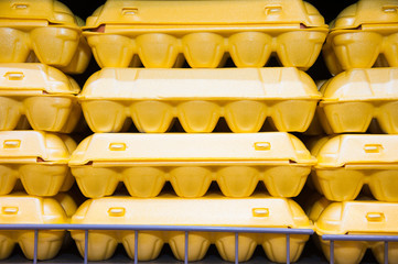 Fototapeta na wymiar Packaging of eggs in shop