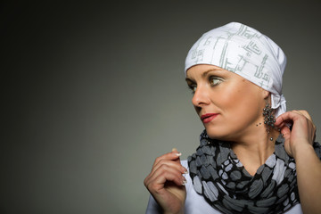 beautiful middle age woman cancer patient wearing headscarf