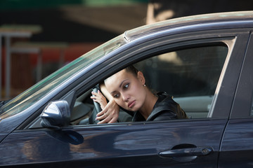 Beautiful girl driving a car