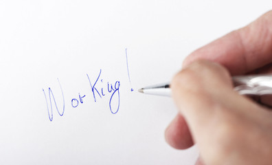 Working word written on paper.