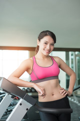 Fototapeta na wymiar woman stand on treadmill