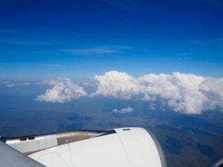 Wing of the plane on a background of sky