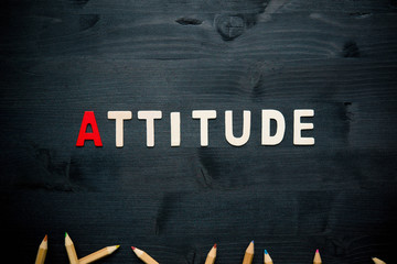 Fototapeta na wymiar wooden word attitude on background business concept