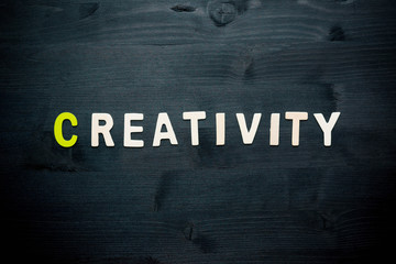 Fototapeta na wymiar wooden word creativity on background business concept