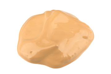 Round face make-up liquid foundation sample isolated on white background, clipping path included