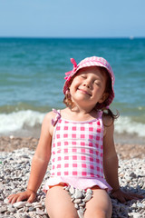 happy little girl on beach