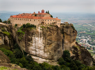 Fototapeta na wymiar The Monastery of St. Stephen with a small church at the complex of Meteora monasteries in Greece