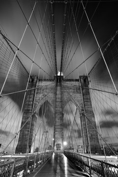 Brooklyn bridge during night, black and white photo