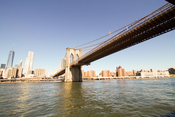 Naklejka premium Brooklyn bridge in a sunny day in New York