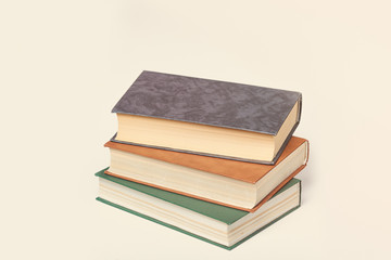 photo of cool pile of books on the wonderful white studio background