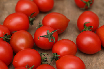 Fresh bright and juicy tomatoes on the kitchen
