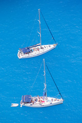 Two white sailboats in the Mediterranean Sea 