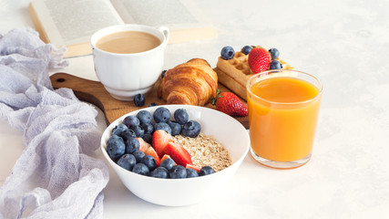 Cup of coffee and croissants on white background. Morning breakfast